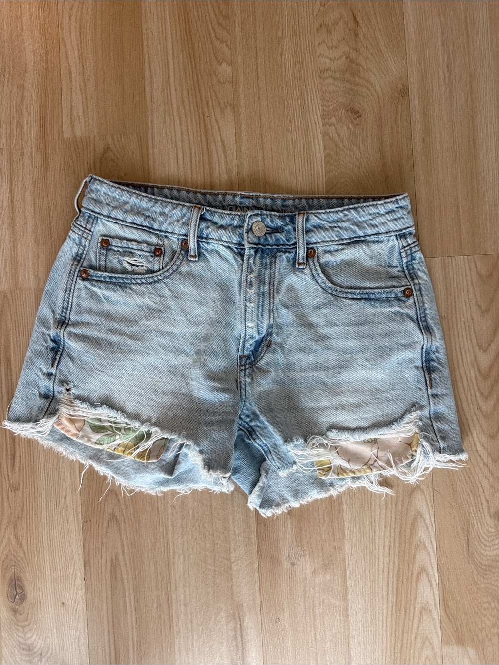 American Eagle Outfitters Light Blue Distressed Jean Shorts with Floral Underlay